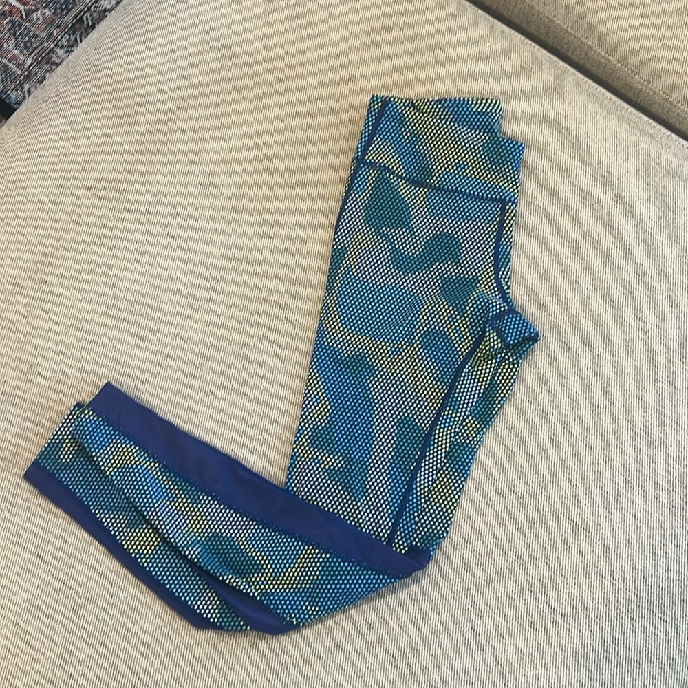 Nike running legging. Full length. Mesh side windows. Back zipper.